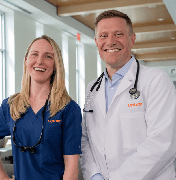 Male and Female Doctor smiling at Optum OR